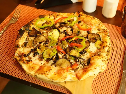 Vegetable pizza with grilled peppers and aubergine