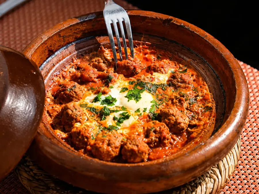 Kefta tagine with a soft egg, served bubbling